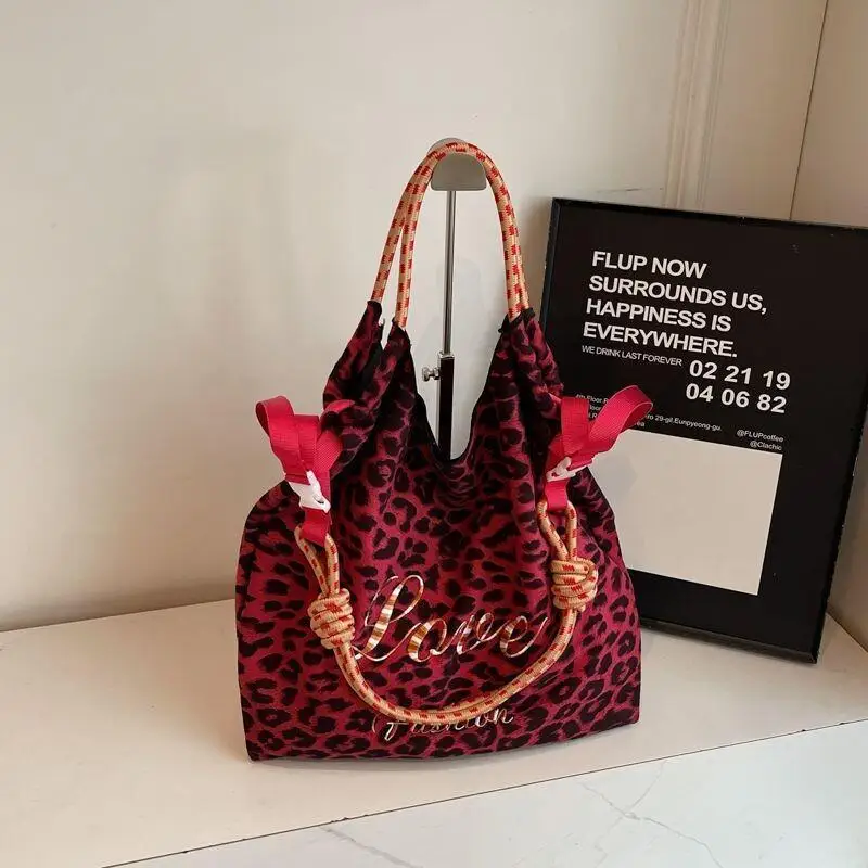 

Women's Backpack Travel Bag Tote Shoulder Bag Canvas Women Commuting New Casual Leopard Print Large Capacity Versatile 2025
