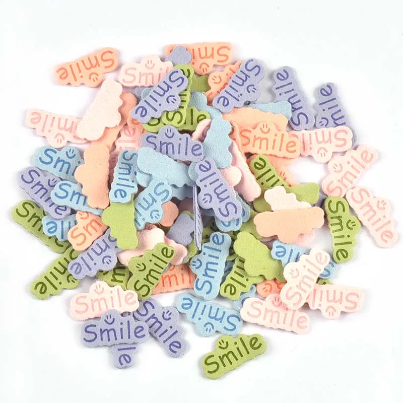 30pcs 14.5x29mm Smile Letter Embossed Leather Labels For Clothes Sewing Accessories DIY Bag Kid Garment Craft Handmade Tag C3707