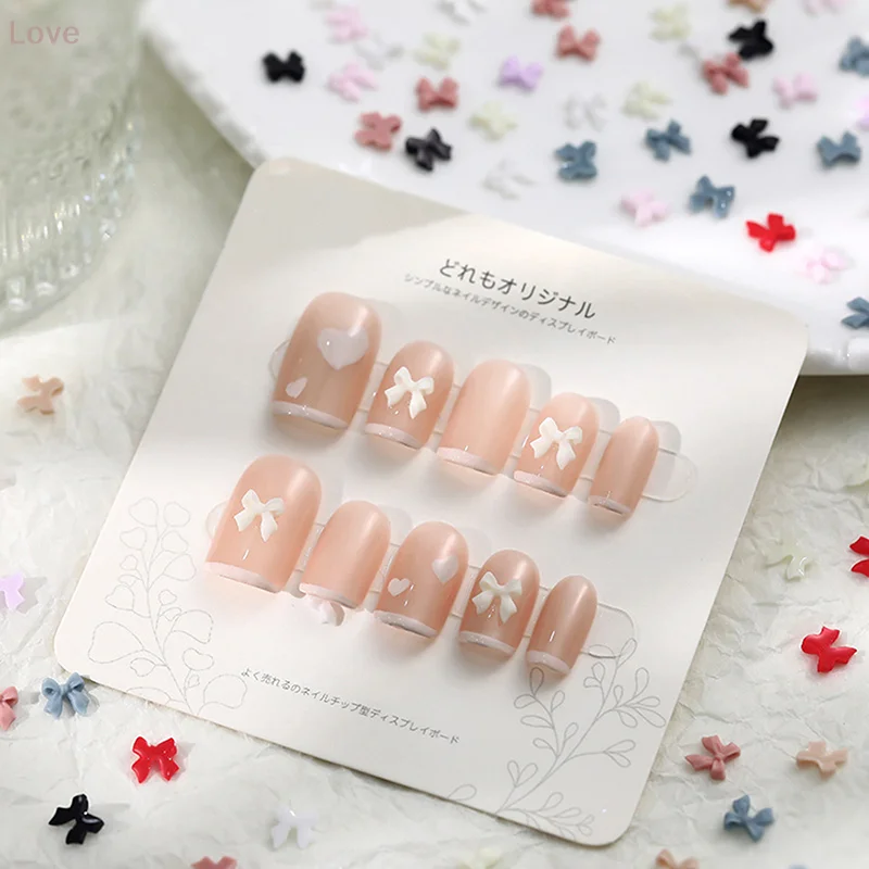 [L & P] 50 قطعة القوس الراتنج مسمار الفن الديكور ثلاثية الأبعاد كريم اللون Bowknot مسمار حلية حلية مجوهرات DIY بها بنفسك مانيكير الإكسسوارات الكلاسيكية