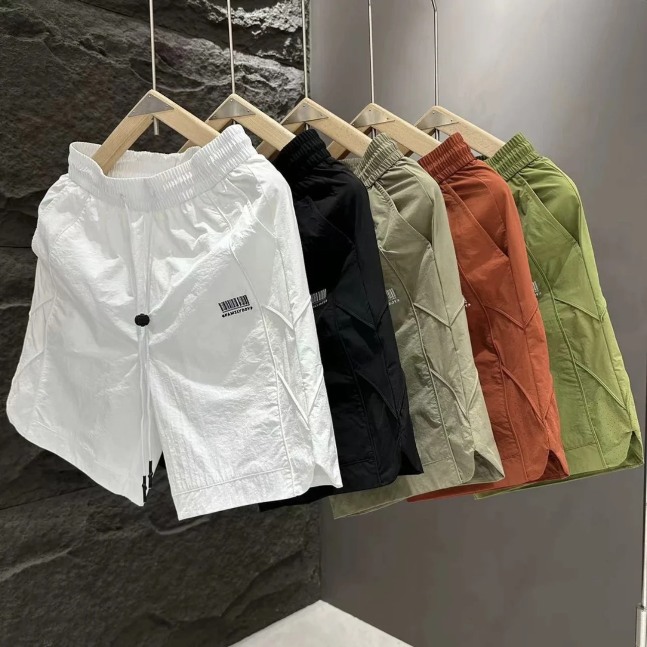 Summer New Casual Thin Straight Five-Quarter Men's Shorts Laser Perforated Mesh Loose Breathable Quick-Dry Elastic Waistband