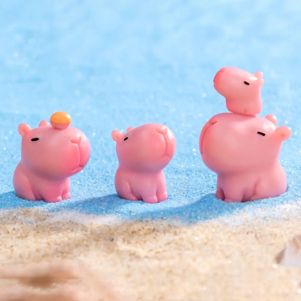 รูปปั้นคาปิบาร่ารูปการ์ตูนทำจากเรซินสีชมพูรูปแกะสลักขนาดเล็กแบบ DIY รูปปั้นหุ่นรูปสัตว์ขนาดเล็ก