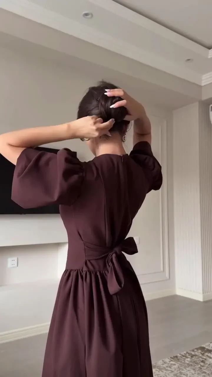 Nouveau style de robe pour femme de printemps de Dubaï au tempérament élégant. Il a une jupe longue à col rond et une jupe longue à grande balançoire