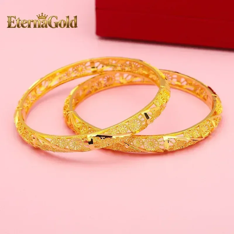 

Браслет EternaGold из настоящего золота 9999 пробы с полым четырехлистным клевером и широкой застежкой из 24-каратного золота для женщин, для праздничных мероприятий и свадеб.