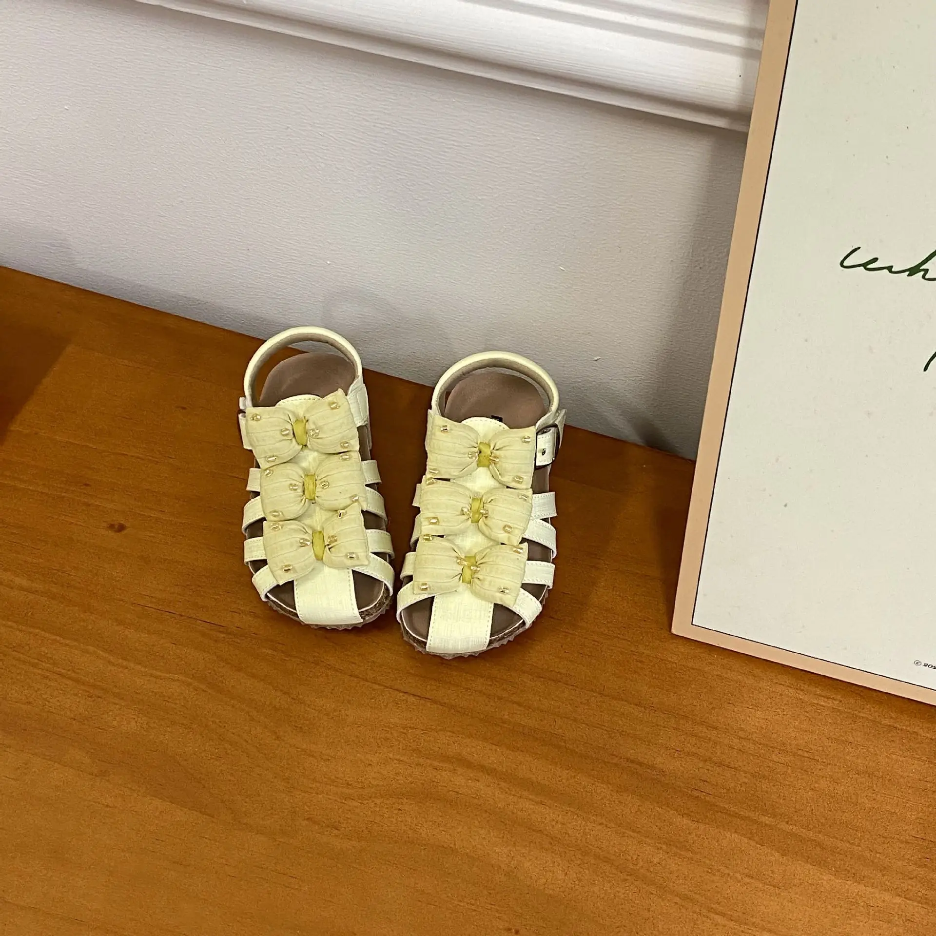 Picture 5: Girls Hollow Out Sandals 2026 Summer Bow Roman Sandals for Kids Breathable Beach Shoes Toddler Princess Sandals