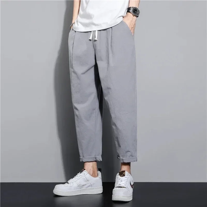 

New Trend Versatile Casual Loose Sports Leather Handsome Breathable Long Pants for Men