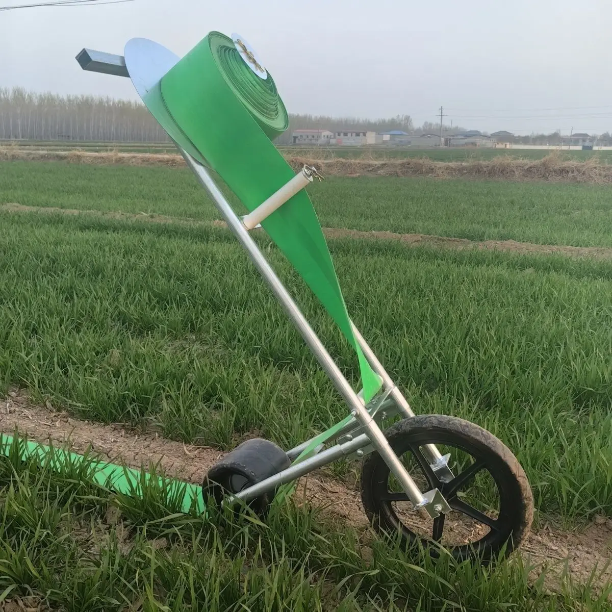 Paving micro-spray belt trolley supervisor laying tools pipe artifact paving water drip irrigation belt watering