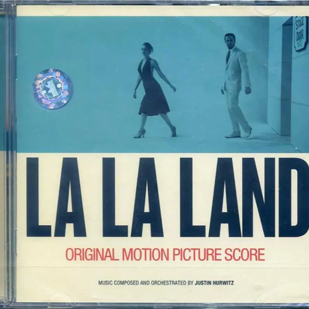 

CD с саундтреком из фильма La La Land — романтические треки для джазового попугая | для любителей кино и музыки