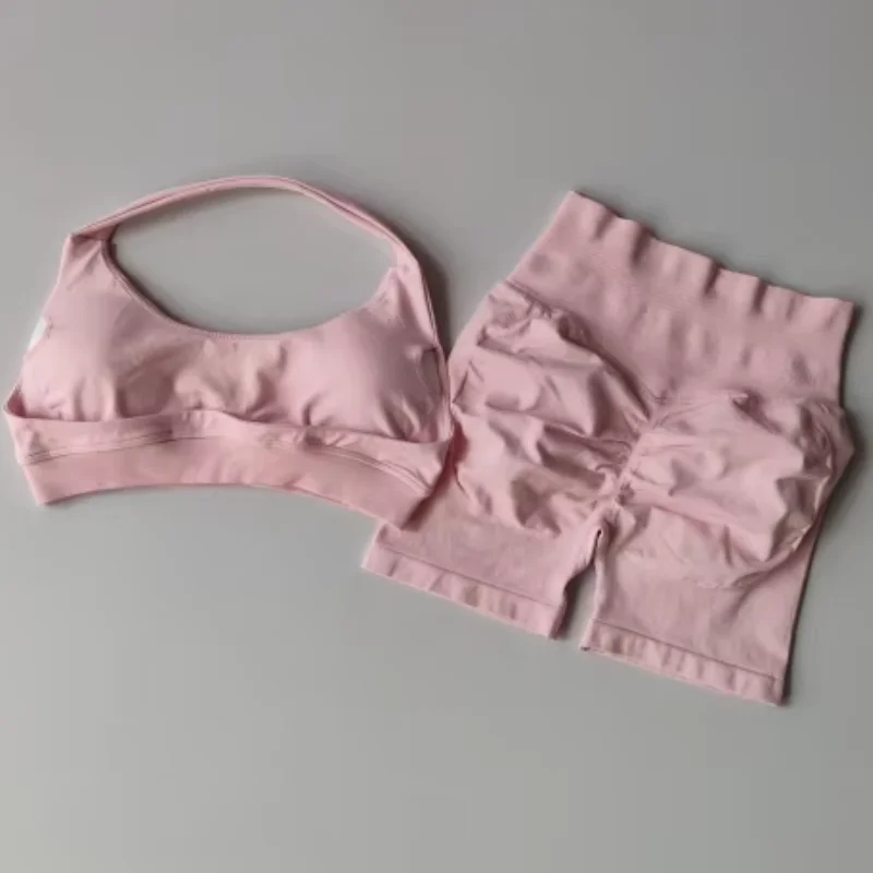 ชุดออกกำลังกายโยคะผู้หญิงคุณภาพสูงแบบใหม่ เสื้อกล้ามไร้ตะเข็บแบบผูกเชือก กางเกงขาสั้นออกกำลังกายแบบมีรอยขีดข่วน ชุดออกกำลังกายสำหรับผู้หญิง