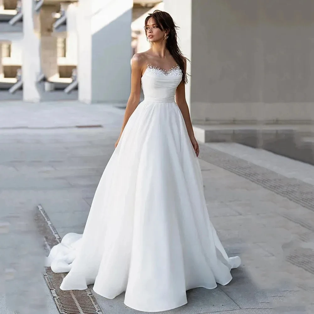 

New White A Line Wedding Dress 2025 Sheer Neck Sleeveless Pearls Beads Organza Bride Gowns Vestidos De Novias Robe De Mariage