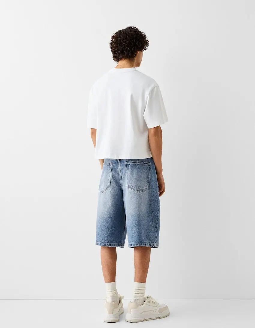 صيف جديد أزياء الرجال غسلها خمر بلون فضفاض واسعة الساق الركبة طول الجينز السراويل الأمريكية مطاطا الدنيم السراويل الذكور