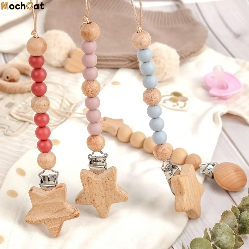 

Dummy Clips Pacifier Holder Clips Star Soother Holder Baby Pacifier Chain Wood Nipple Holder Clips Baby Teether Toys Straps Baby