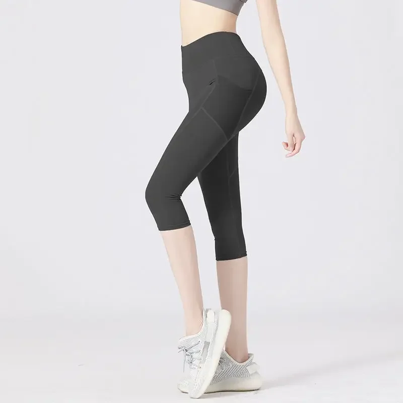 Seven-point fitness pants women's belly-holding peach liquid hip-lifting elastic tight-fitting yoga high-waist running sports