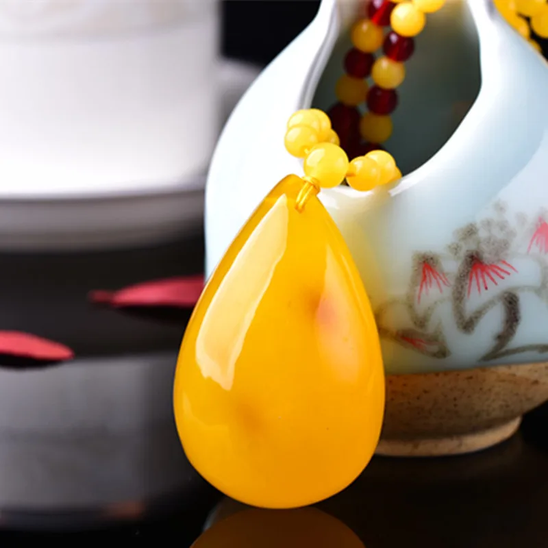 Gift Exhibition: Honey Wax Amber Water Drop Pendant Necklace, Simple Design for Men and Women
