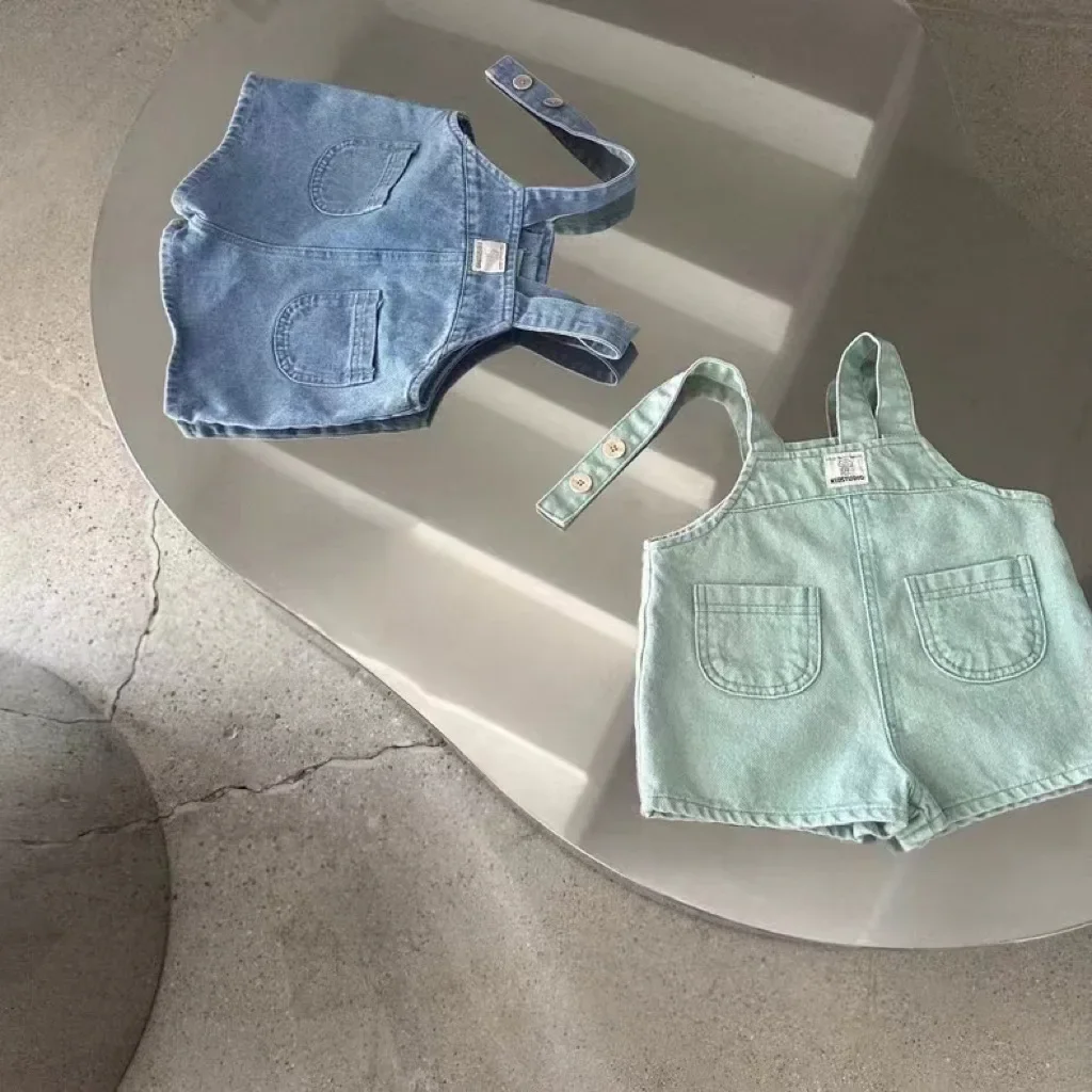 

2025 New Baby Girl Denim Strap Shorts Infant Solid Loose Versatile Overalls Toddler Sleeveless Jumpsuit Kids Boys Casual Pants