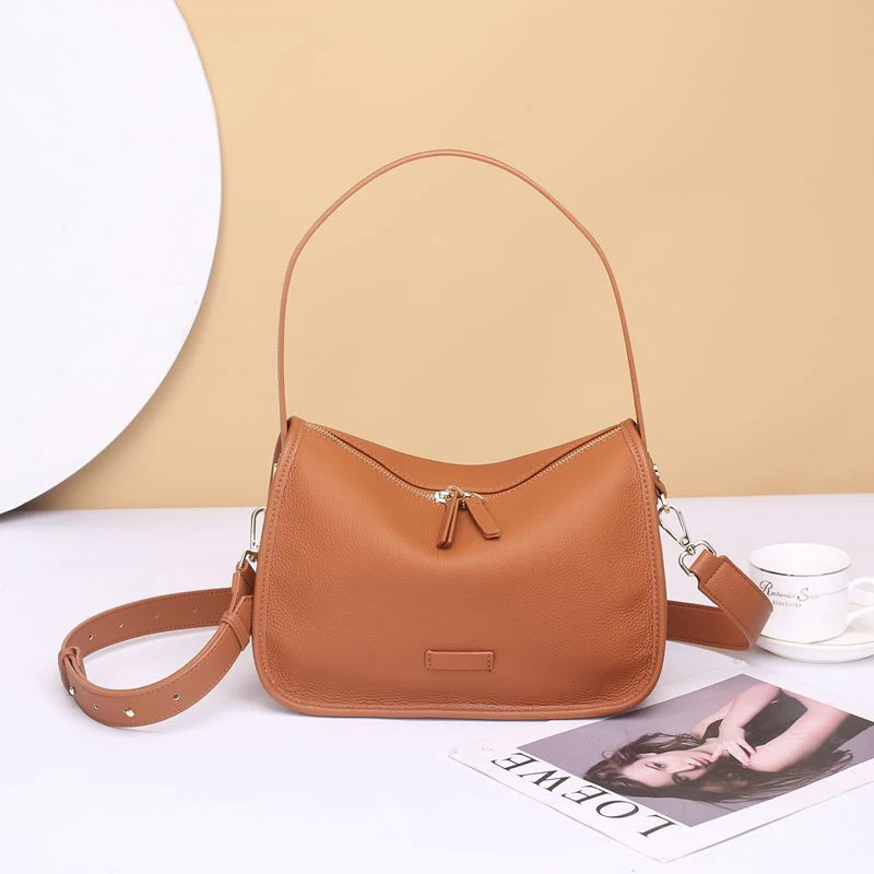 Bolso de mano versátil de cuero genuino para mujer, bandolera de un solo hombro, Color sólido, a la moda, para viaje, novedad