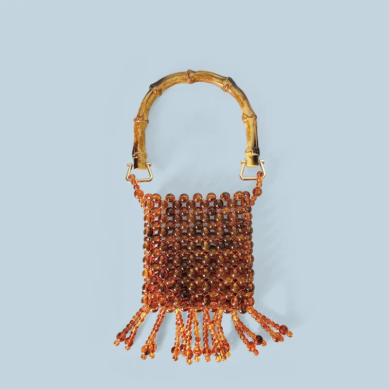 24 year autumn new imitation bamboo handmade woven bead pearl tassel banquet amber handbag
