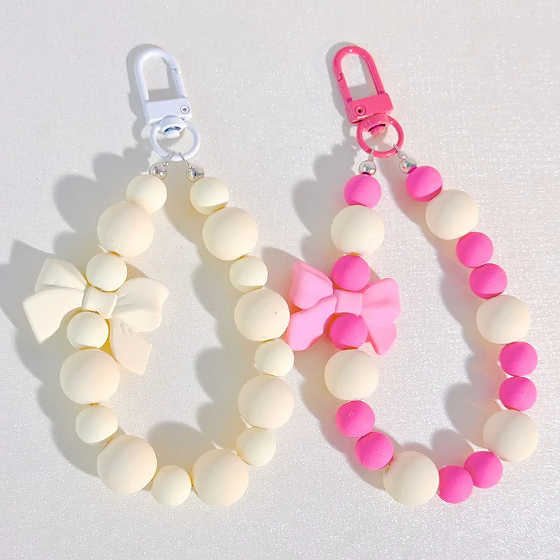 الوردي اللؤلؤ القوس المفاتيح مطرز قلادة مكافحة خسر حبل الهاتف المحمول سلسلة سماعة حقيبة سيارة المفاتيح حقيبة الظهر التبعي