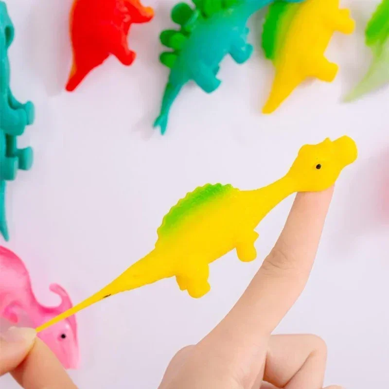 4PC Ejection Dinosaur Fun Toy Finger Dart Launching Dinosaur Decompression Soft Adhesive New and Unique