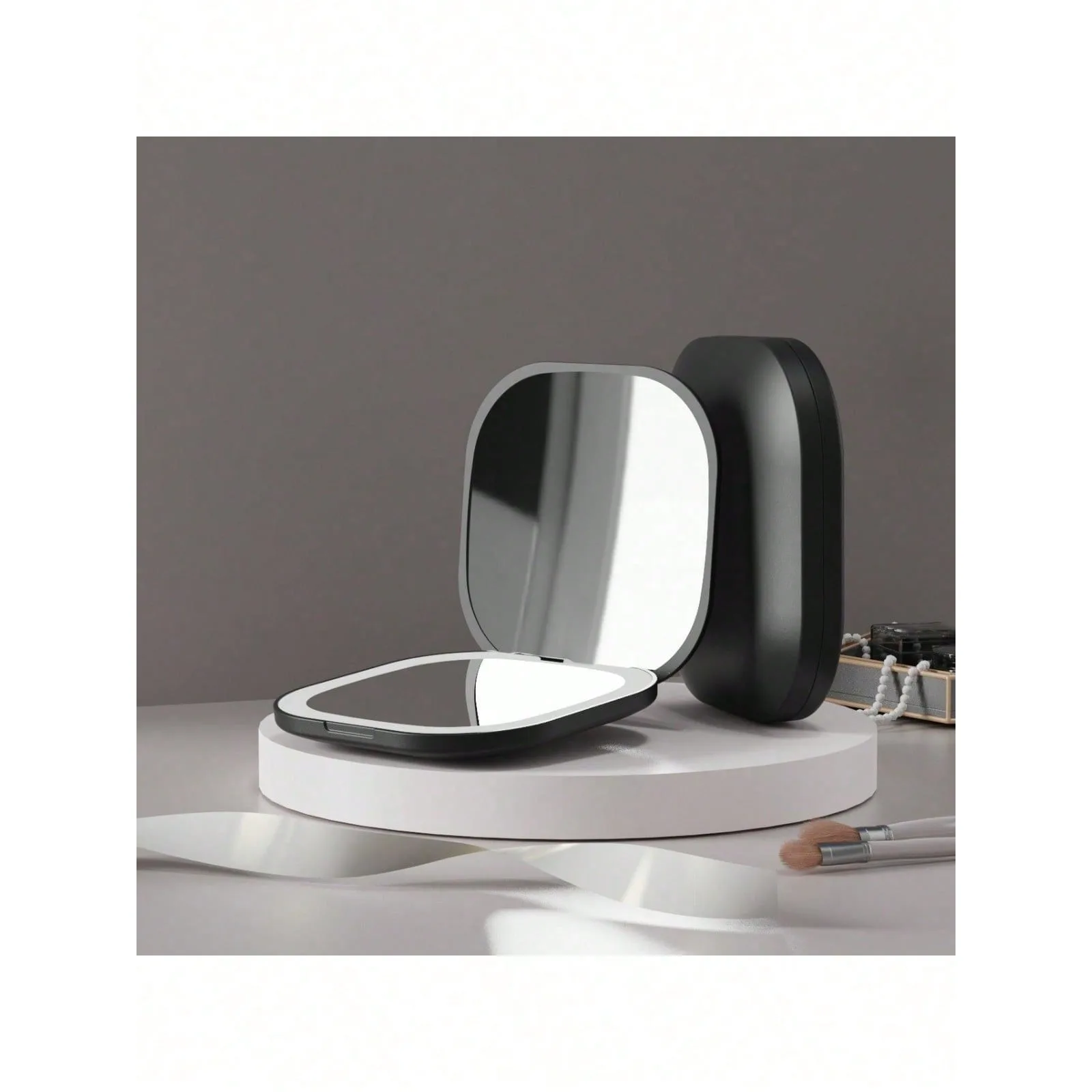 

Folding lighted makeup mirror with 2X magnification, portable pocket size. Travel essential & room decor, ideal Valentine's gift