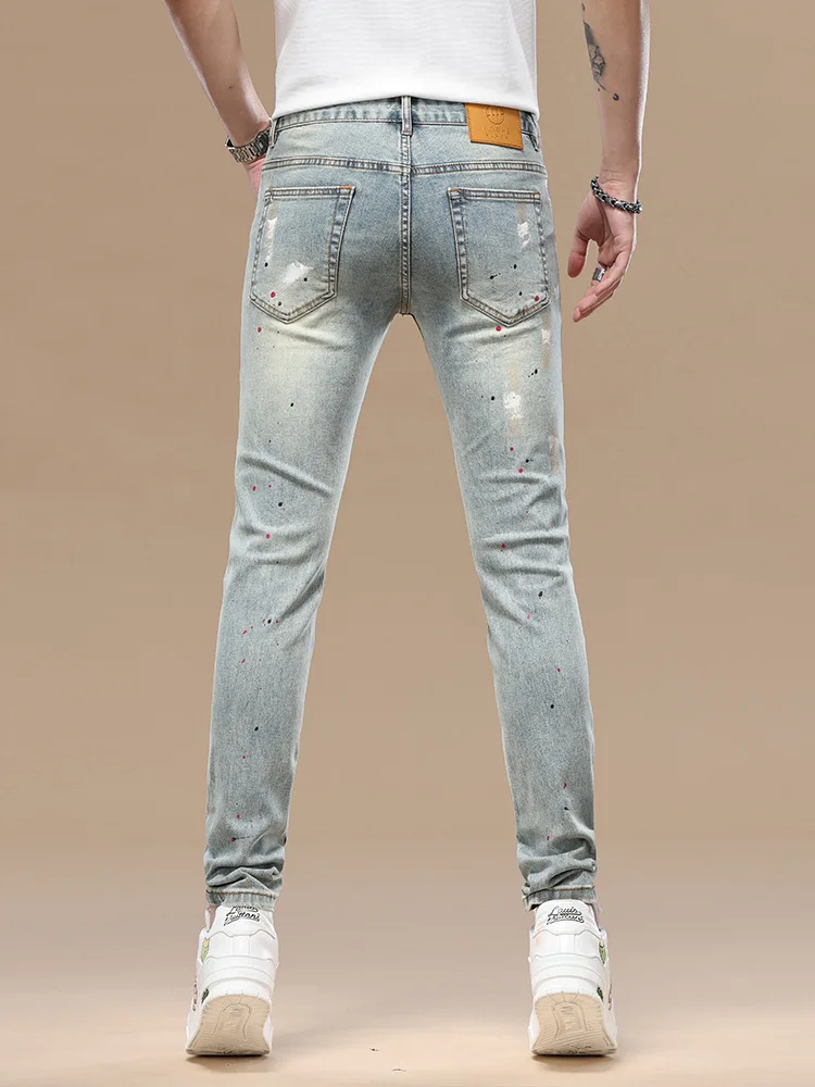 High end ripped patch nine inch jeans for men with slim fit and small feet, 2025 spring/summer new fashion trend printed pants