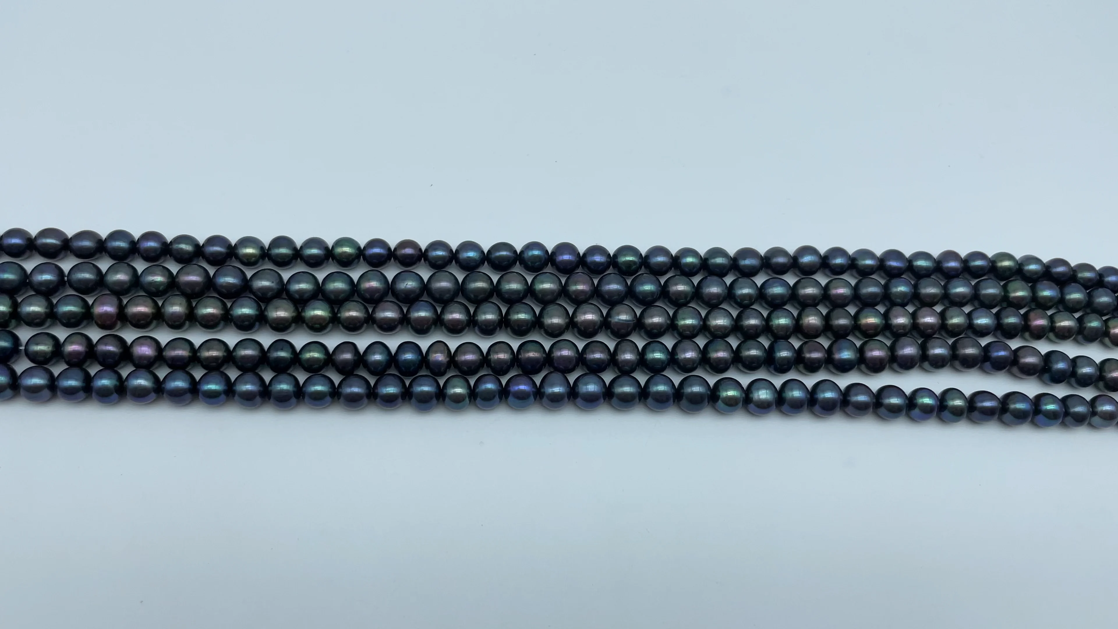 Hot Sale Natural Color Peacock Black 7-8mm Near Round Shape Freshwater Pearl Strands