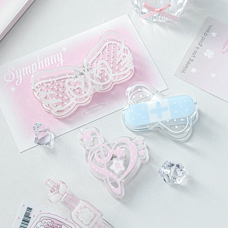 1 PC Kawaii Musiknote Flügel Acryl Buch Clip Lesehilfe Feste Buch Halter Lesezeichen Kreatives Design Praktisch für Buchhandlung