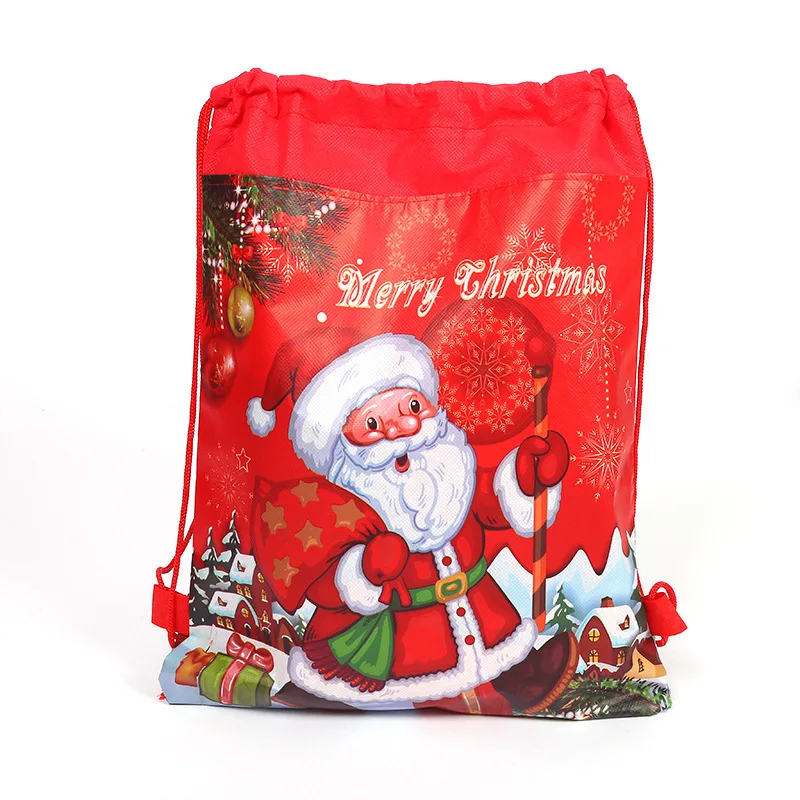 

20pcs/Lot Christmas Santa Claus Theme Mochila Happy Birthday Party Non-woven Fabrics Kids Boys Favors Drawstring Gifts Bags