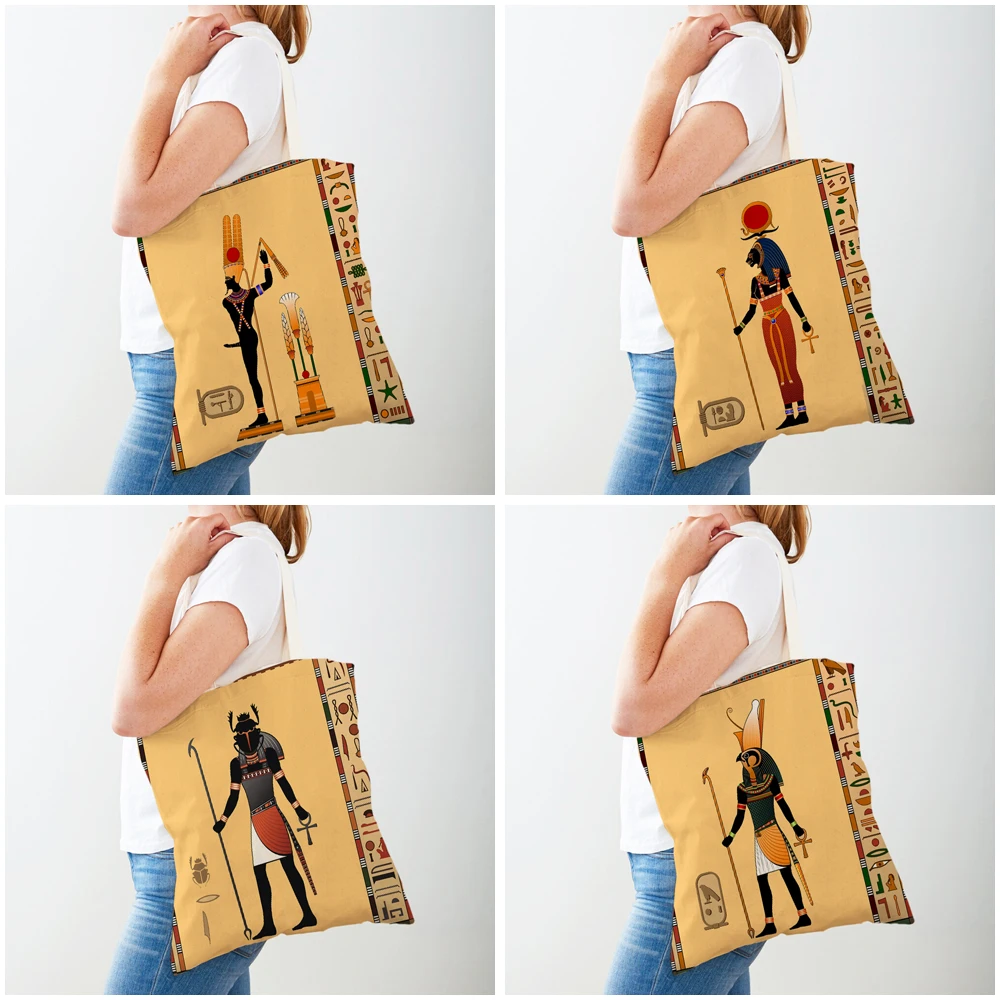 Bolsos de compras del faraón del tótem del Antiguo Egipto, bolso de compras de lona informal, bolsos de mano de viaje reutilizables de dibujos animados de Anubis para mujer