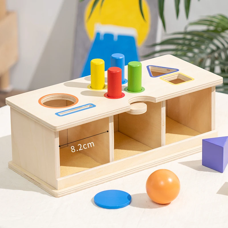 

Wooden Shape Matching Toy Box with Multiple Shape Pieces Helps children recognize shapes and practice hand-eye coordination