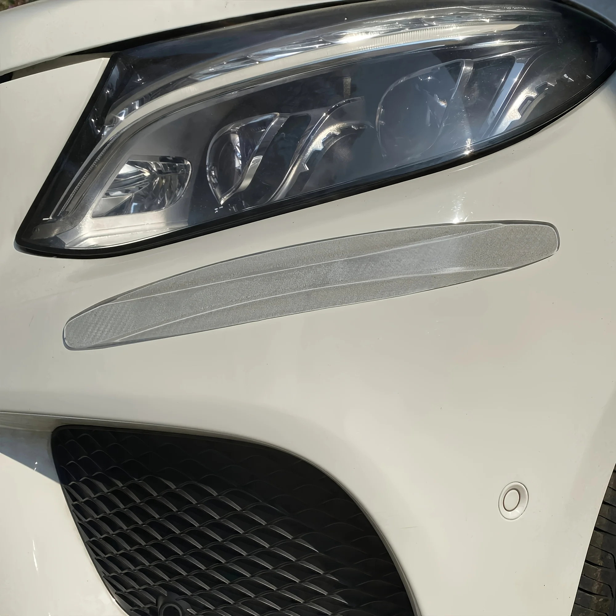 

Clear Car Protection Tape Roll, Heavy Duty & Stretchable, Shields Against Shopping Carts, Door Dings, and Road Debris