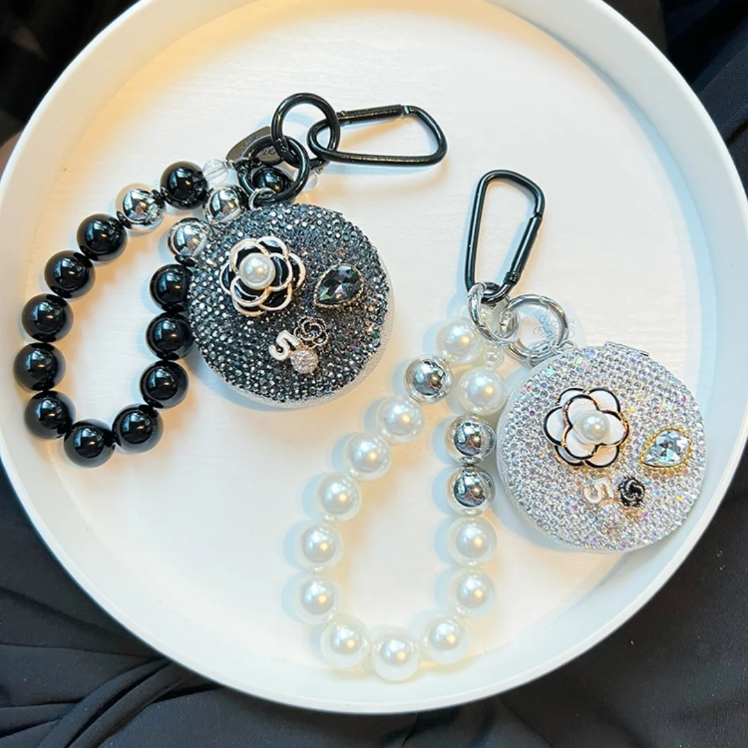 Przenośne składane lusterko w torebce, lusterko do makijażu do noszenia w ręce, brelok do kluczy z lusterkiem w kształcie kwiatka do samochodu.