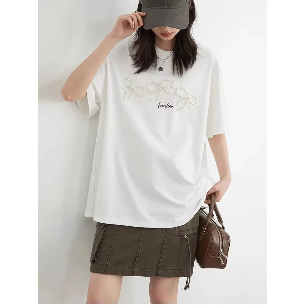 Damskie luźne koszulki T-shirty z krótkim rękawem, nowe, oryginalne, z perłową kokardą, zdobione koralikami, fajne damskie topy na lato.