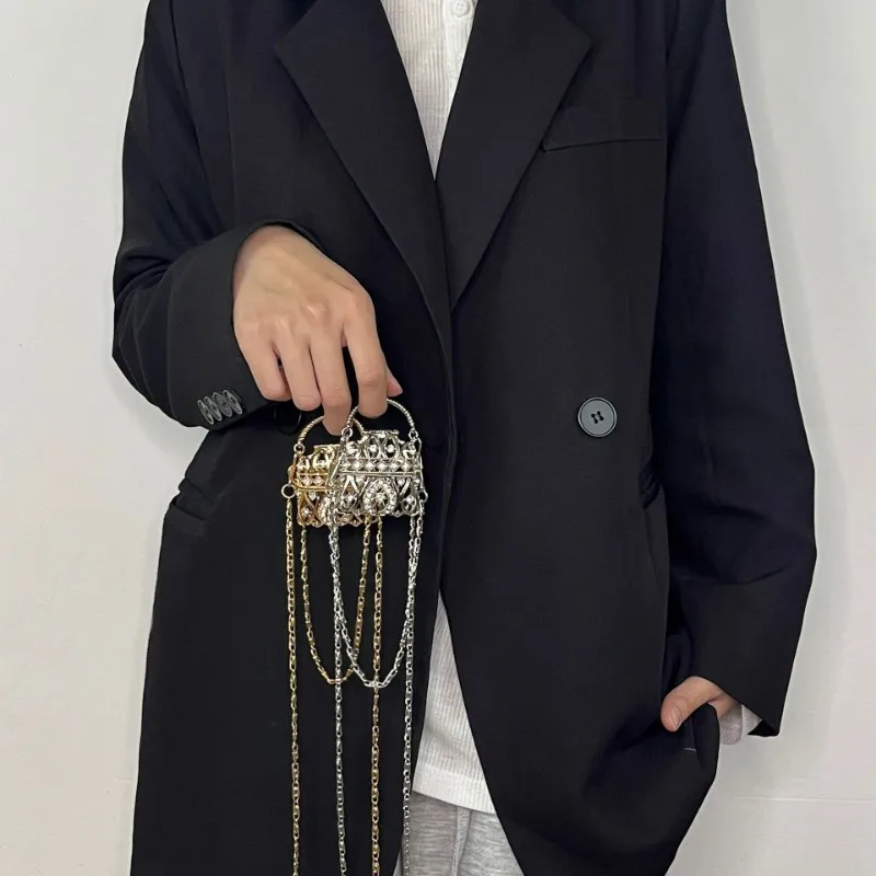 小さな上品な新作リングバッグ、ミニデザインセンスのメタル装飾バッグ、クロスボディ財布、コインパースチェーン
