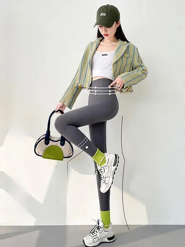 Pantaloni da yoga a vita alta Modello in pelle arca da donna Senza biancheria intima Vita alta Vestibilità comoda Autunno New Sle Casual Nove pantaloni