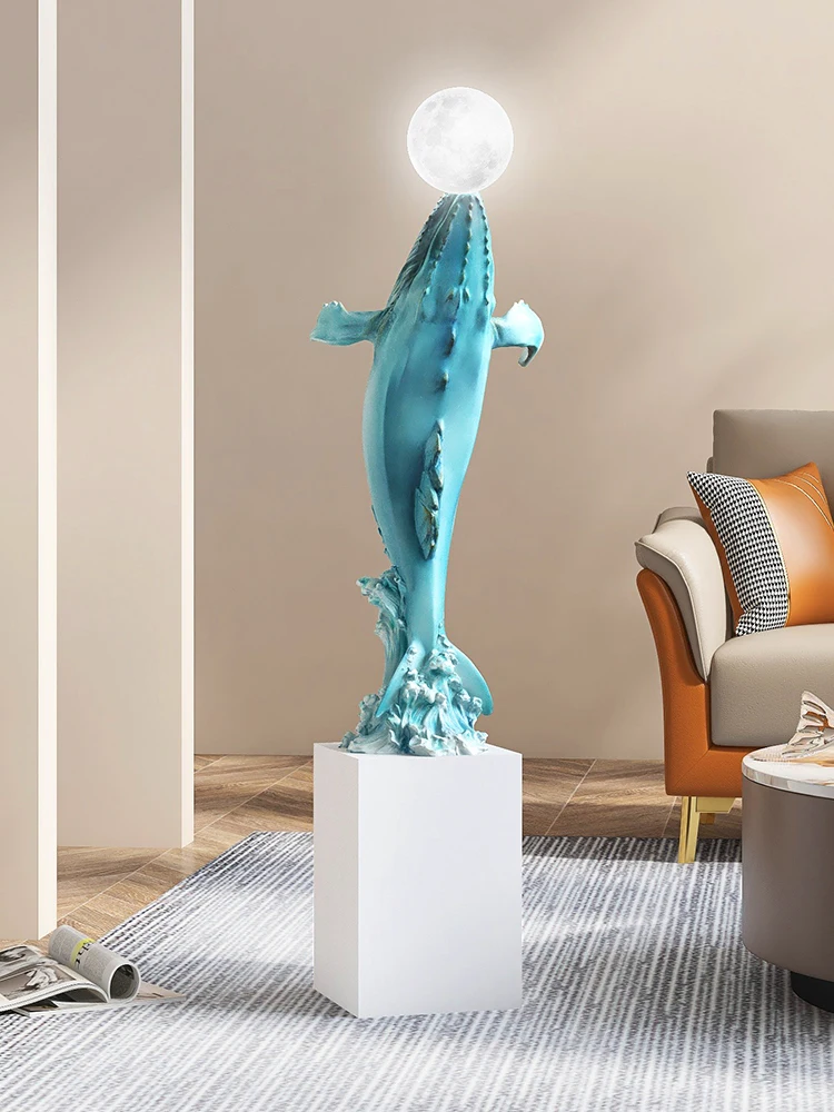 Large floor to ceiling creative whale ornaments in the living room, home soft decorations next to the foyer sofa, housewarming a