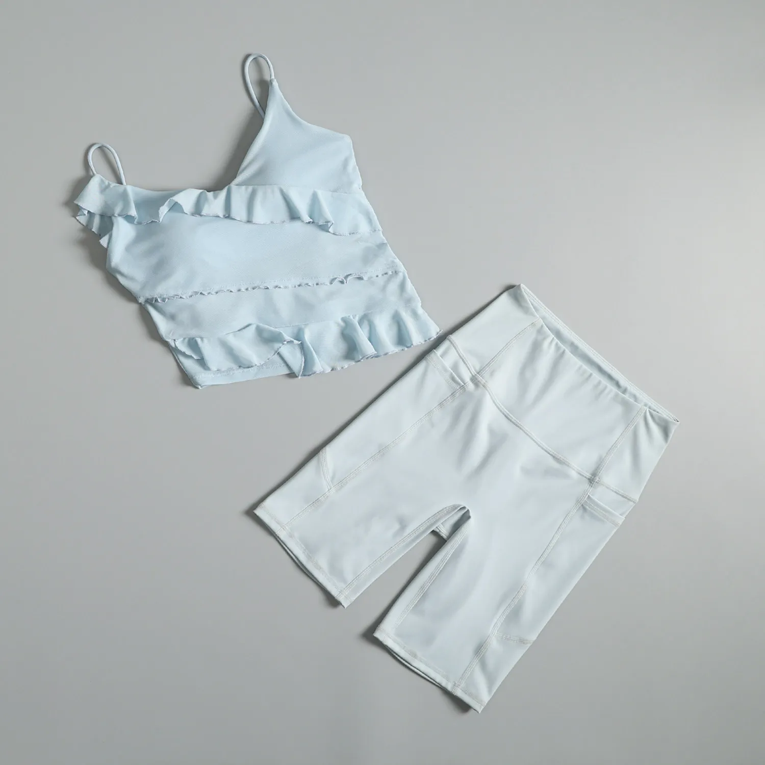 

Костюм для йоги и фитнеса для женщин, летний, универсальный, для бега и тренировок, красивый и сексуальный, модный спортивный быстросохнущий костюм.