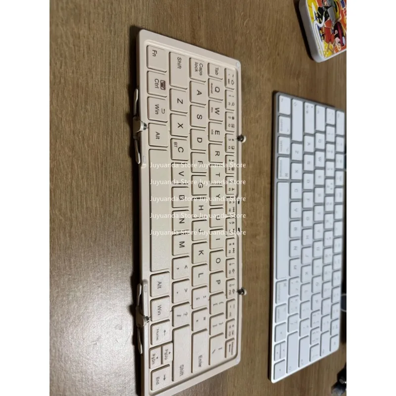 

Folding Bluetooth Keyboard Mouse Set Notebook Ipad Phablet Mobile Phone Universal Boys and Girls Portable