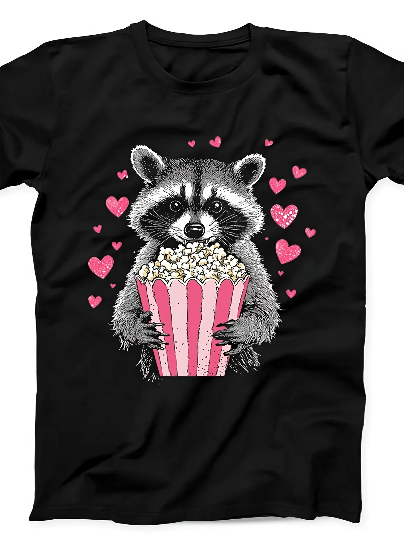 

Raccoon Eating Popcorn Hearts Graphic Black T-Shirt Cute Animal Lover Casual Cotton Crew Neck Tee