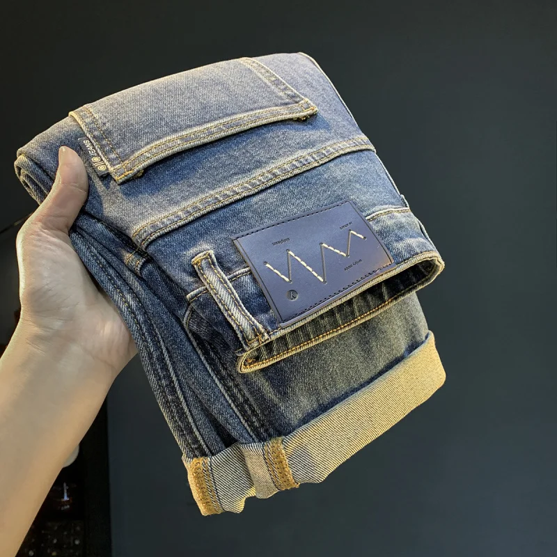 Jeans larghi taglie forti da uomo, design a gamba dritta lavato retrò, pantaloni da uomo di nuova tendenza della moda autunnale 2025