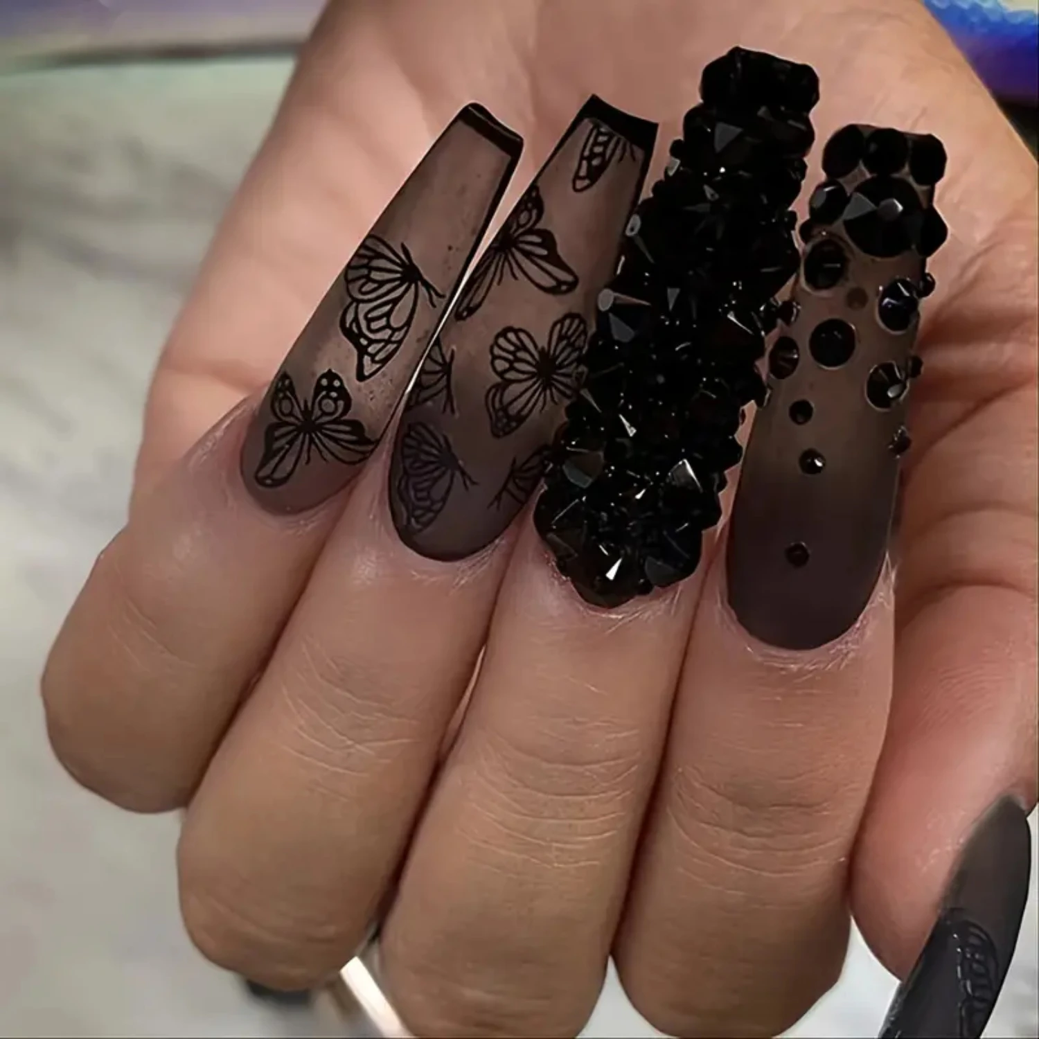 Beautiful and elegant matte black coffin fake nails adorned with stunning 3D rhinestone butterfly design - long press on artific