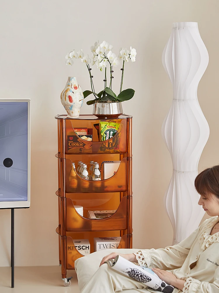 Nordic transparent cart can move several snack racks near the sofa in the living room.