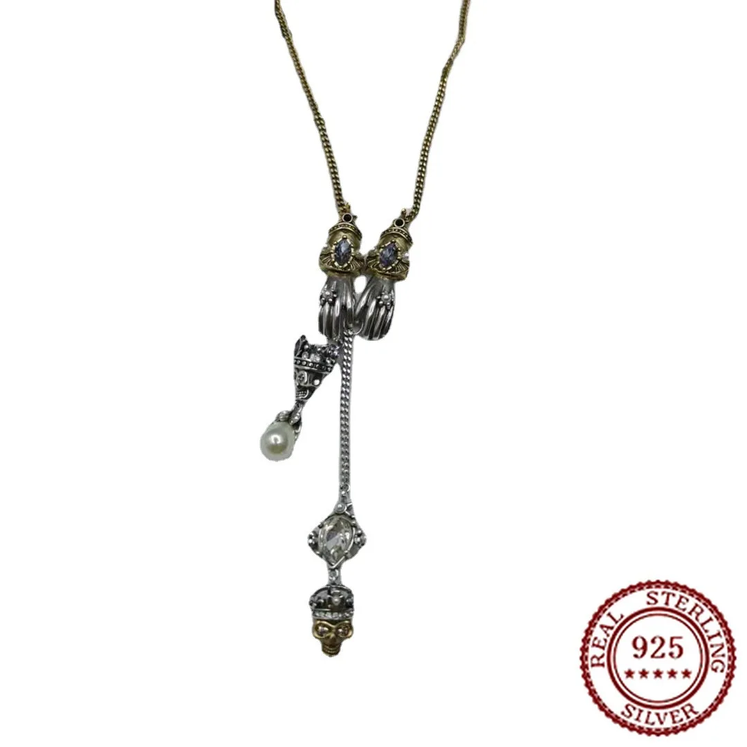

2025 Trend Classic Female Ghost Hand Skull Necklace with Dark Pearls and Diamonds Irregular Collarbone Chain