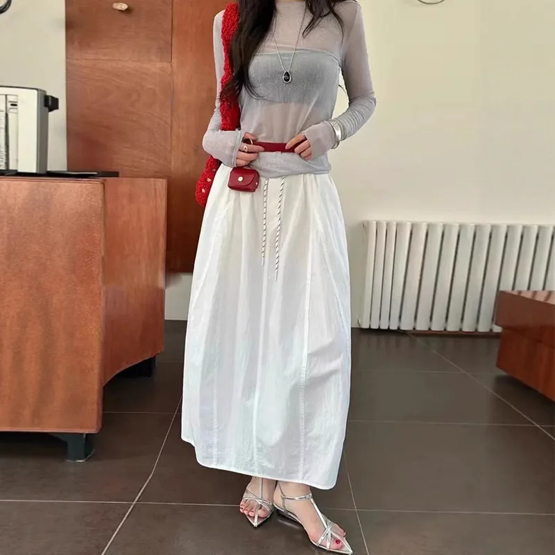 الأدوات تنورة المرأة أوائل الخريف جديد عالية الخصر تنورة منفوشة الرباط كلمة تنورة متوسطة وطويلة