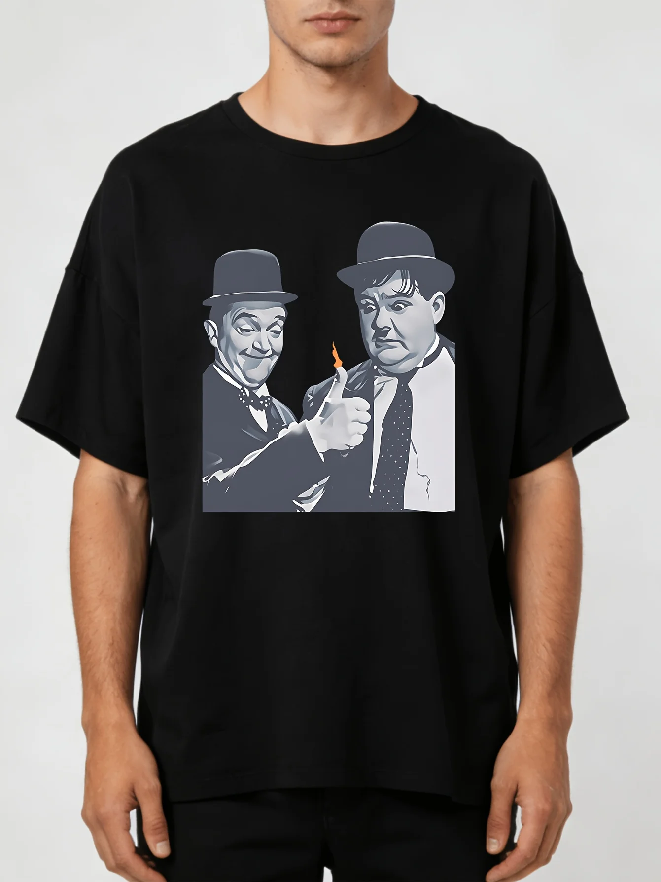 2026 Vintage T-Shirt Featuring The Comedy Duo Stan Laurel And Oliver Hardy - with Laurel Waving And Hardy Pointing. A Classic Te