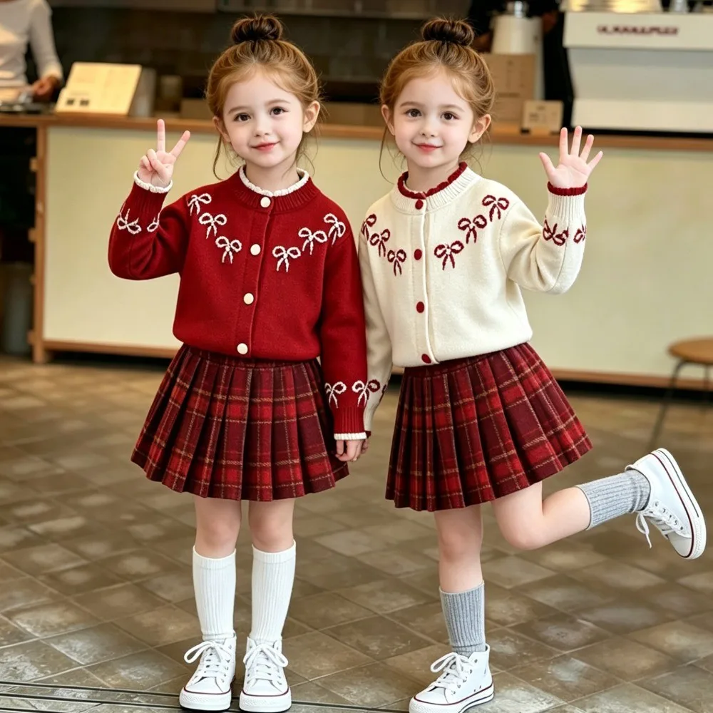 Korean Version Cute Christmas and New Year Knitted Sweater Clothes with Bow Tie Cardigan and Plaid Skirt