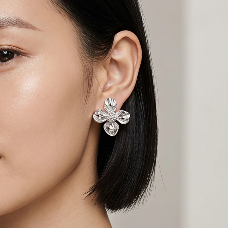 CarlidanaEuropean and American style liquid pleated glossy four-petal flower earrings Cool retro textured floral earrings