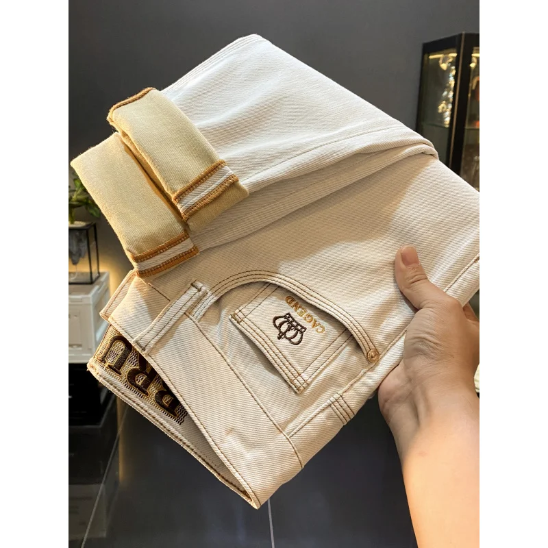 

casual jeans men in autumn 2025, new light luxury trend men's clothing, small straight leg long pants