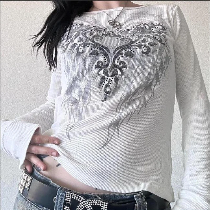 Feather-wing pattern rhinestone-embellished round-neck, elegant and form-fitting long-sleeve women's top.