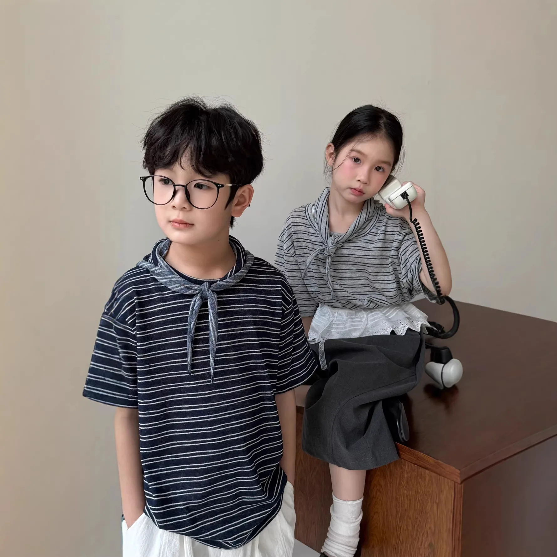 Kids T Shirt 2026 Spring Boys Girls Korean Round Neck Striped Short Sleeve Children Loose Five Point Sleeve T Shirt