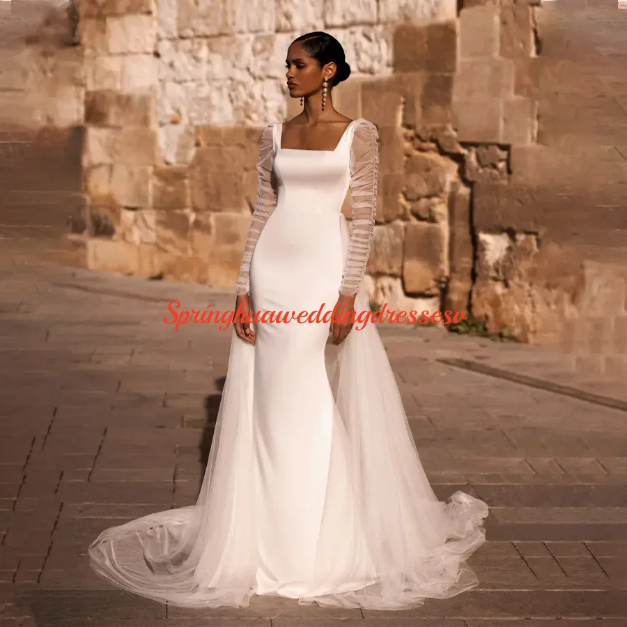 

Элегантное атласное свадебное платье русалки по индивидуальному заказу с длинными рукавами из тюля. Очаровательное свадебное платье с открытой спиной и шлейфом.